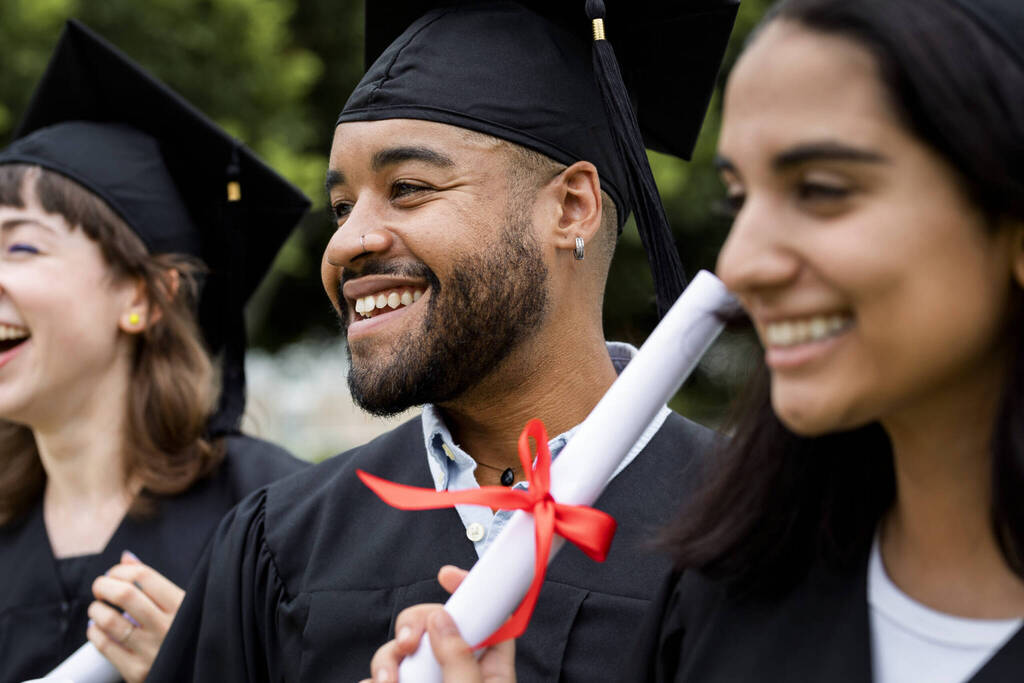 Happy Diverse Students Graduating University, Celebrating With D